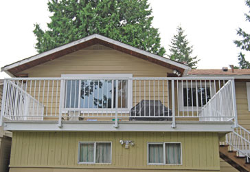 Back Deck with New Railings After Restoration